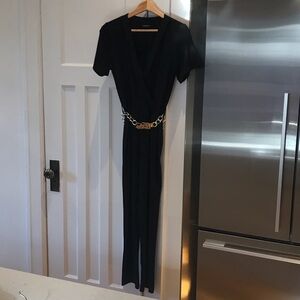 Elegant Black Jumpsuit with Silver Chain Detail